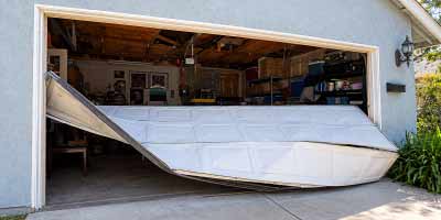 Damaged sectional garage door