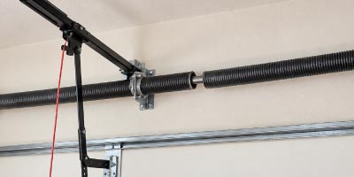 Broken garage door torsion spring