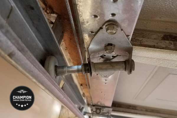 Worn Garage Door Hinge and Roller