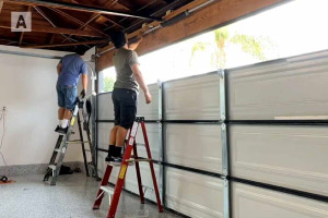Licensed garage door technicians performing service