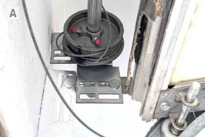 Unraveled garage door cable repair