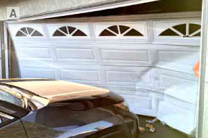 Broken garage door during an emergency service