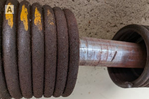 broken garage door spring with 2 inches gap