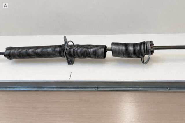Broken Heavy-Duty Spring Broken heavy-duty garage door spring