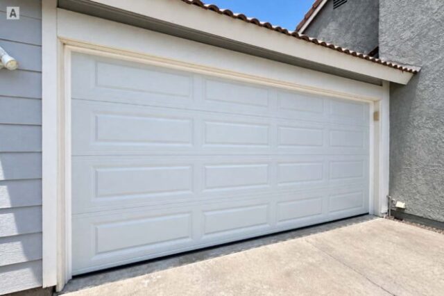 New sectional steel garage door installed in Huntington Beach