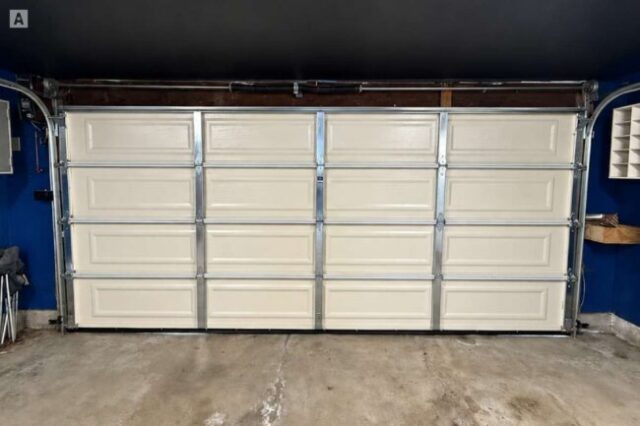 Interior view of new garage door and hardware after replacement in Westminster